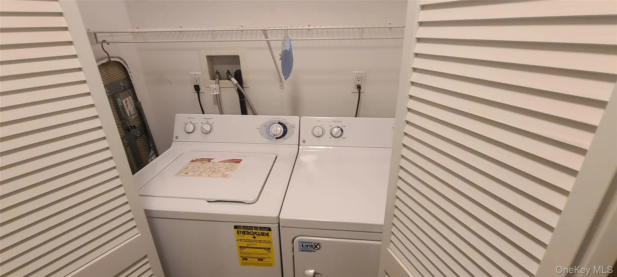Laundry room with separate washer and dryer Laundry room with separate washer and dryer