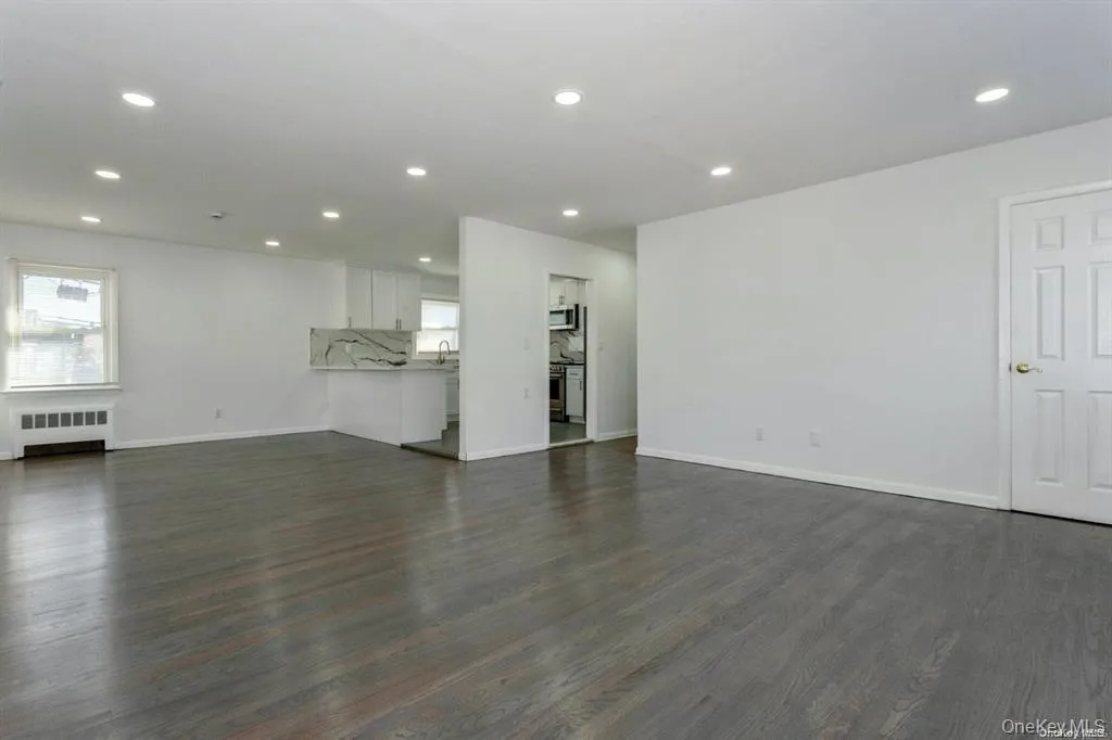 living room featuring recessed lighting, wood floors living room featuring recessed lighting, wood floors