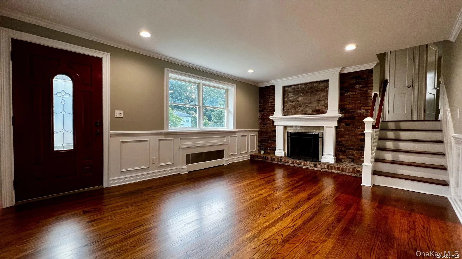 living room with wood burning fire place living room with wood burning fire place