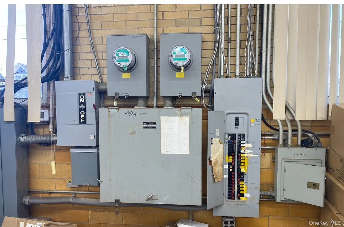 Utility room with electric panel Utility room with electric panel