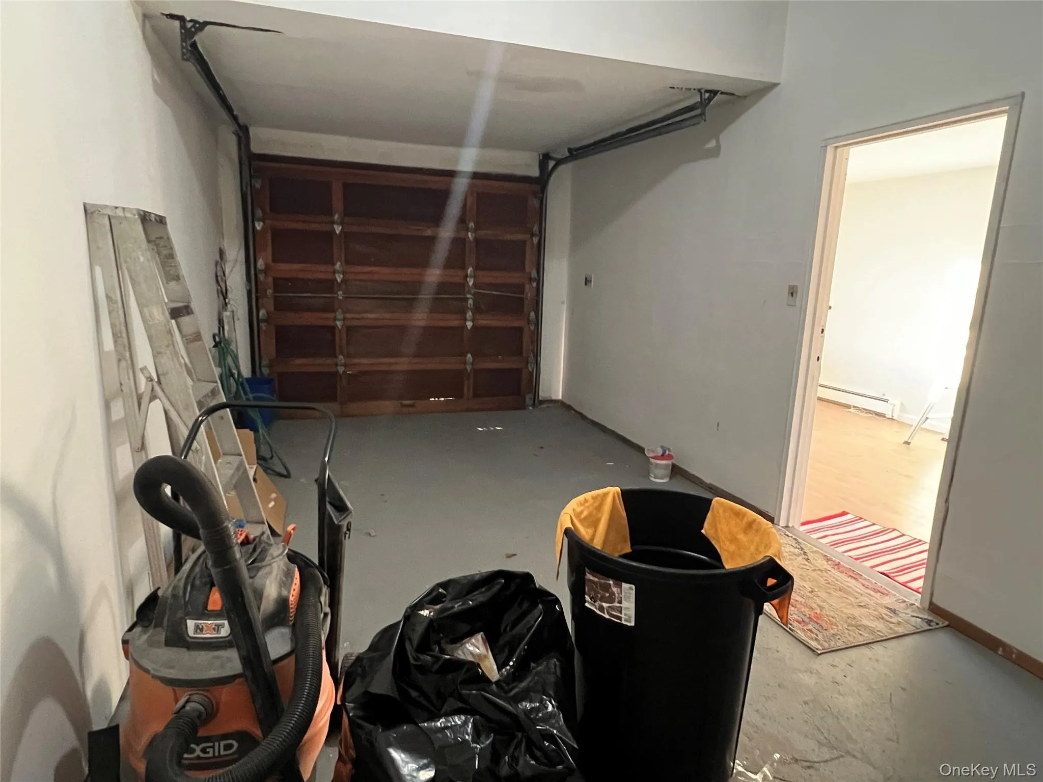 Garage featuring a baseboard radiator Garage featuring a baseboard radiator