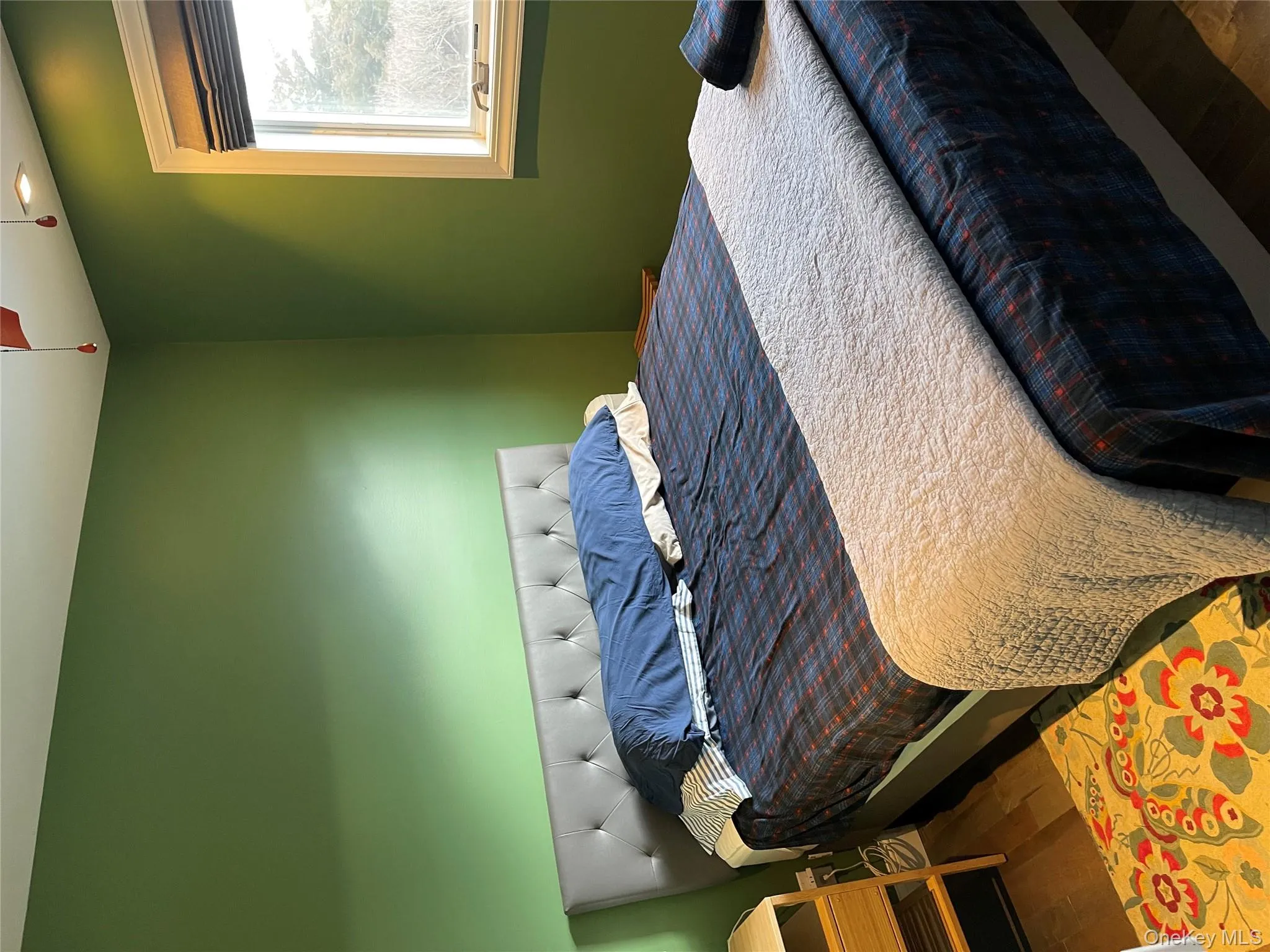 Bedroom featuring hardwood / wood-style flooring Bedroom featuring hardwood / wood-style flooring