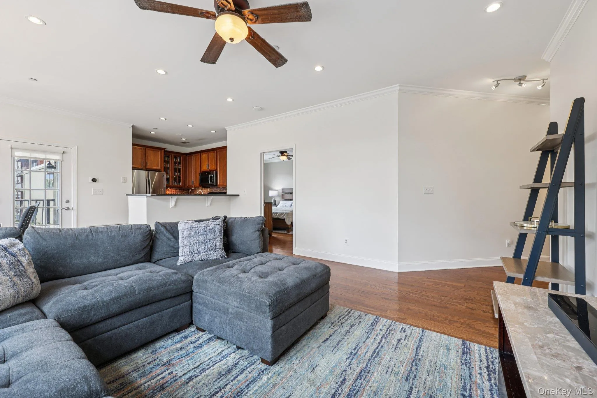 Upgrades include recessed lighting. ceiling fan and crown molding Upgrades include recessed lighting. ceiling fan and crown molding