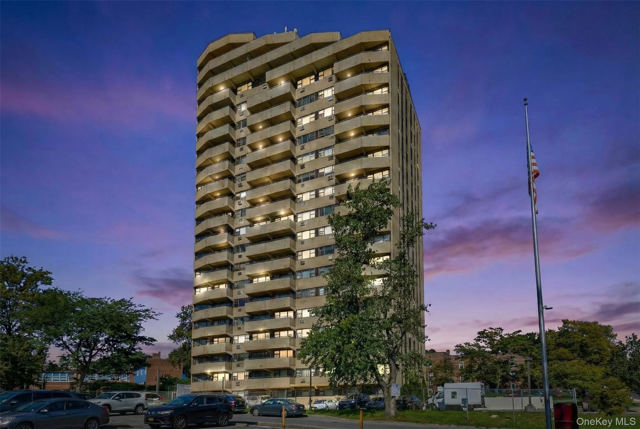 Property at dusk featuring a view of apartment building / complex Property at dusk featuring a view of apartment building / complex