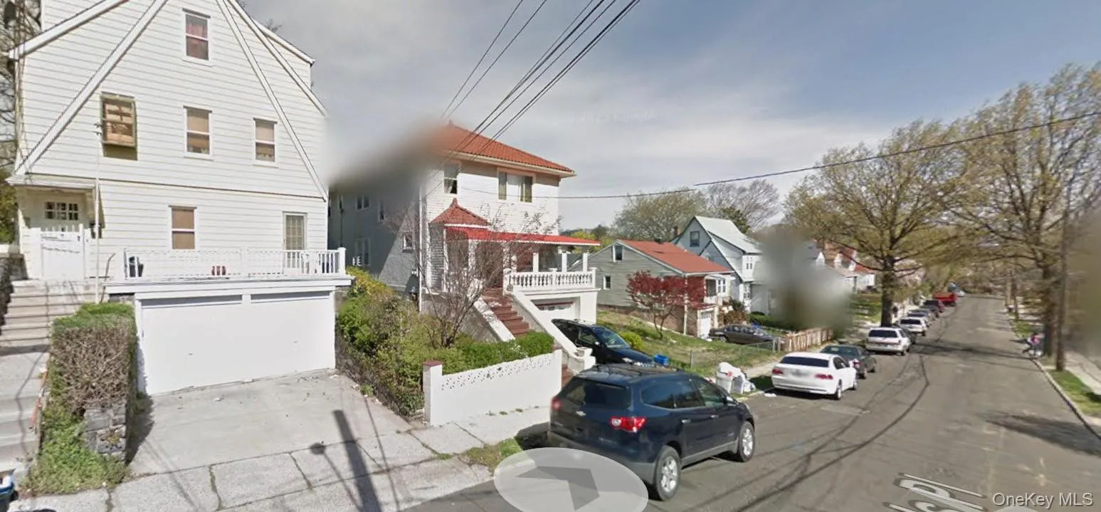 View of asphalt road featuring stairs, a residential view, sidewalks, and curbs View of asphalt road featuring stairs, a residential view, sidewalks, and curbs