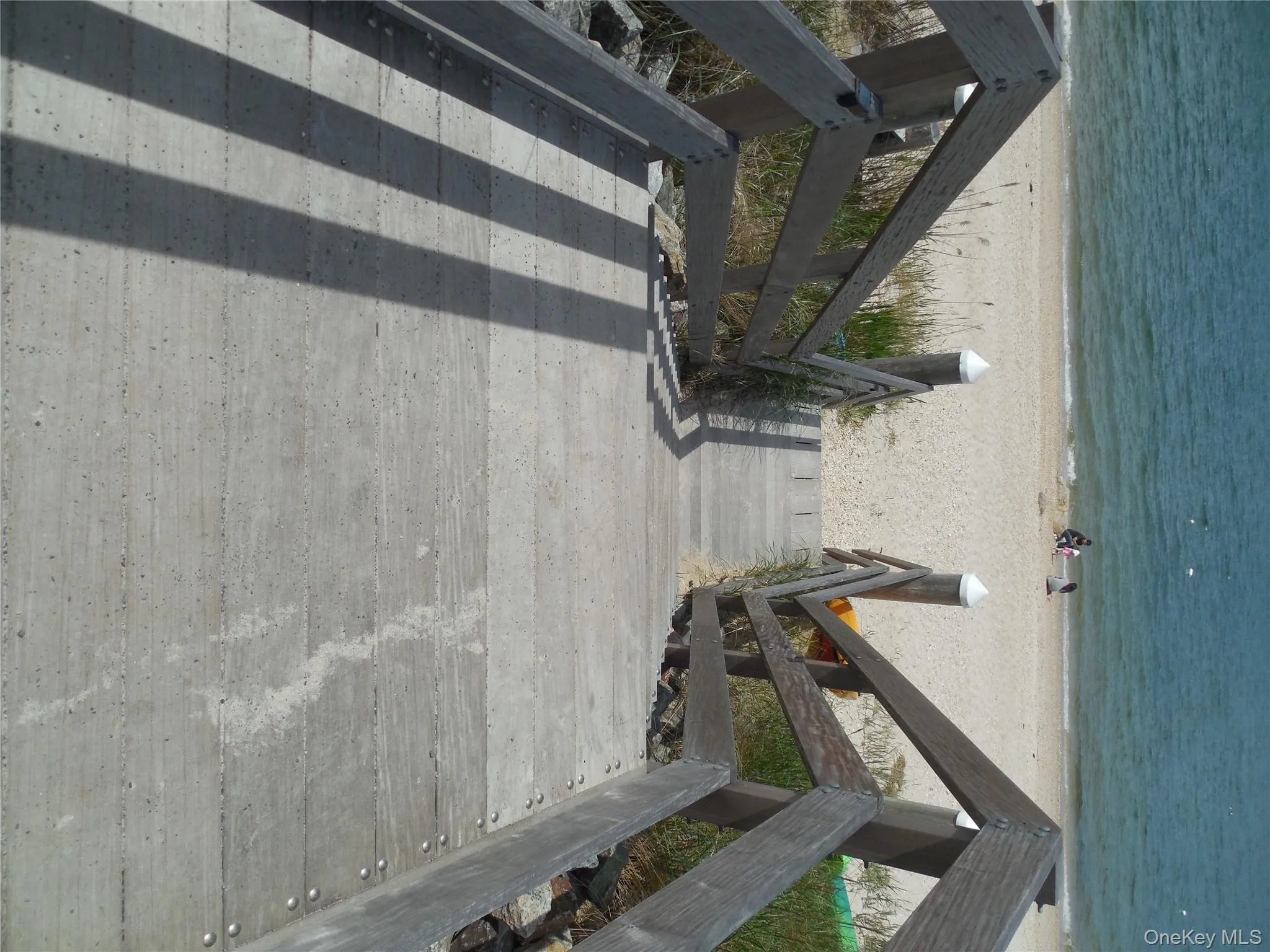 Water view featuring nearby beach Water view featuring nearby beach