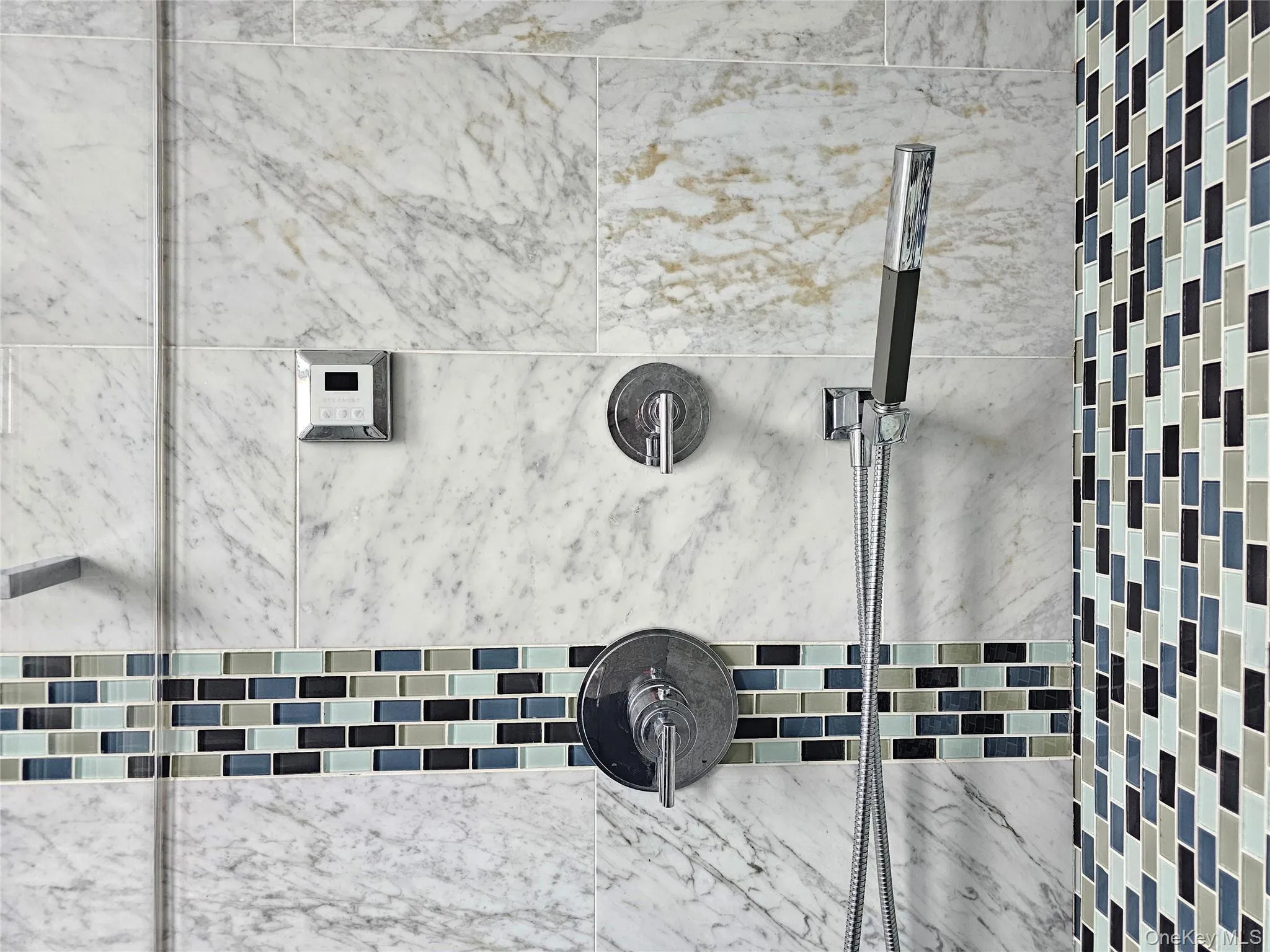 Bathroom view of a tile shower Bathroom view of a tile shower