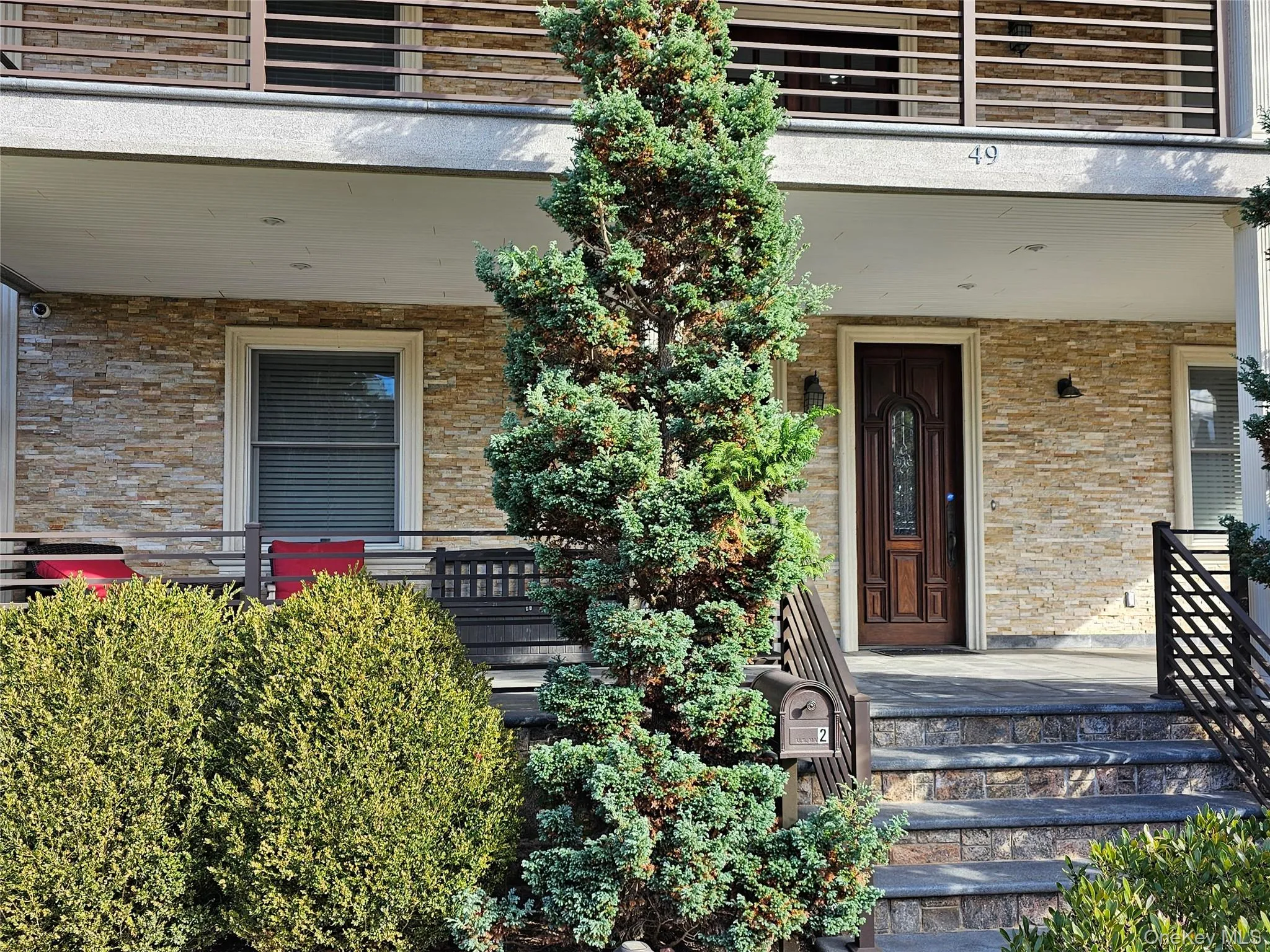 Property entrance featuring brick siding Property entrance featuring brick siding