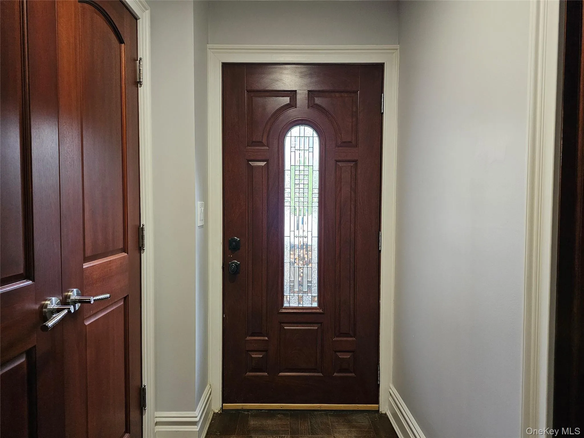 Entryway featuring baseboards Entryway featuring baseboards