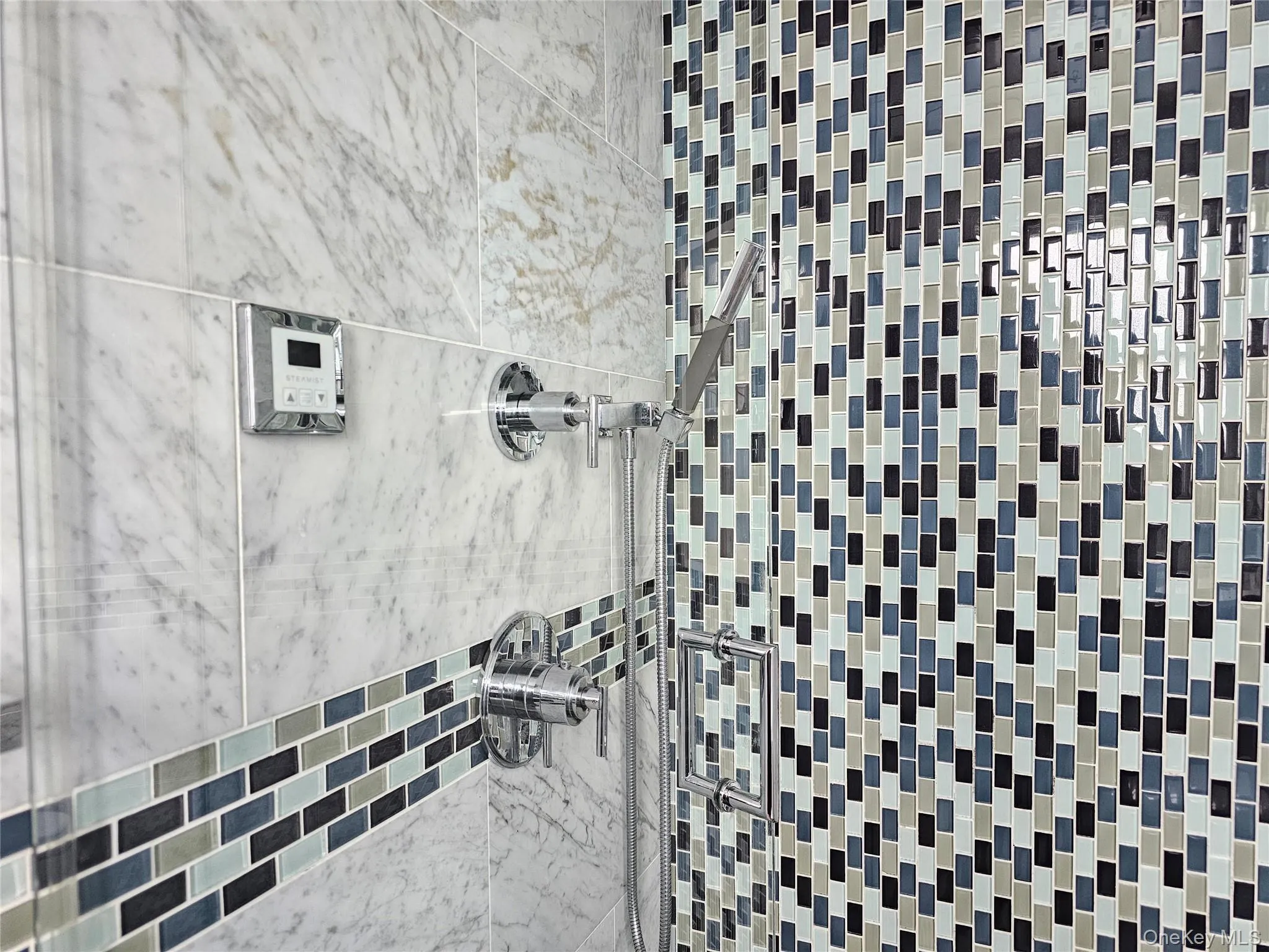 Bathroom with a tile shower Bathroom with a tile shower