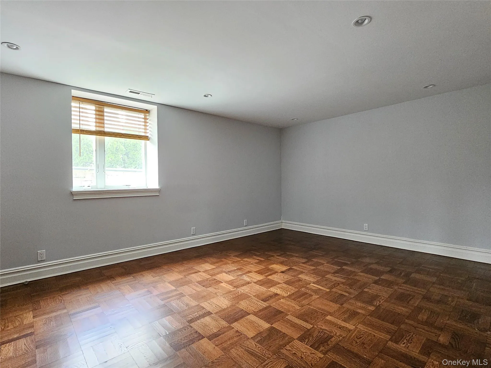 Spare room featuring baseboards Spare room featuring baseboards