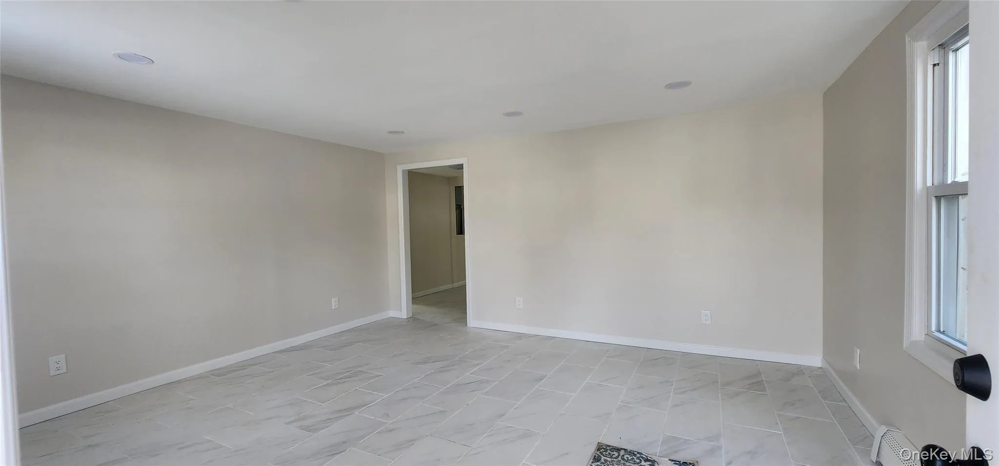 Spare room featuring baseboards Spare room featuring baseboards