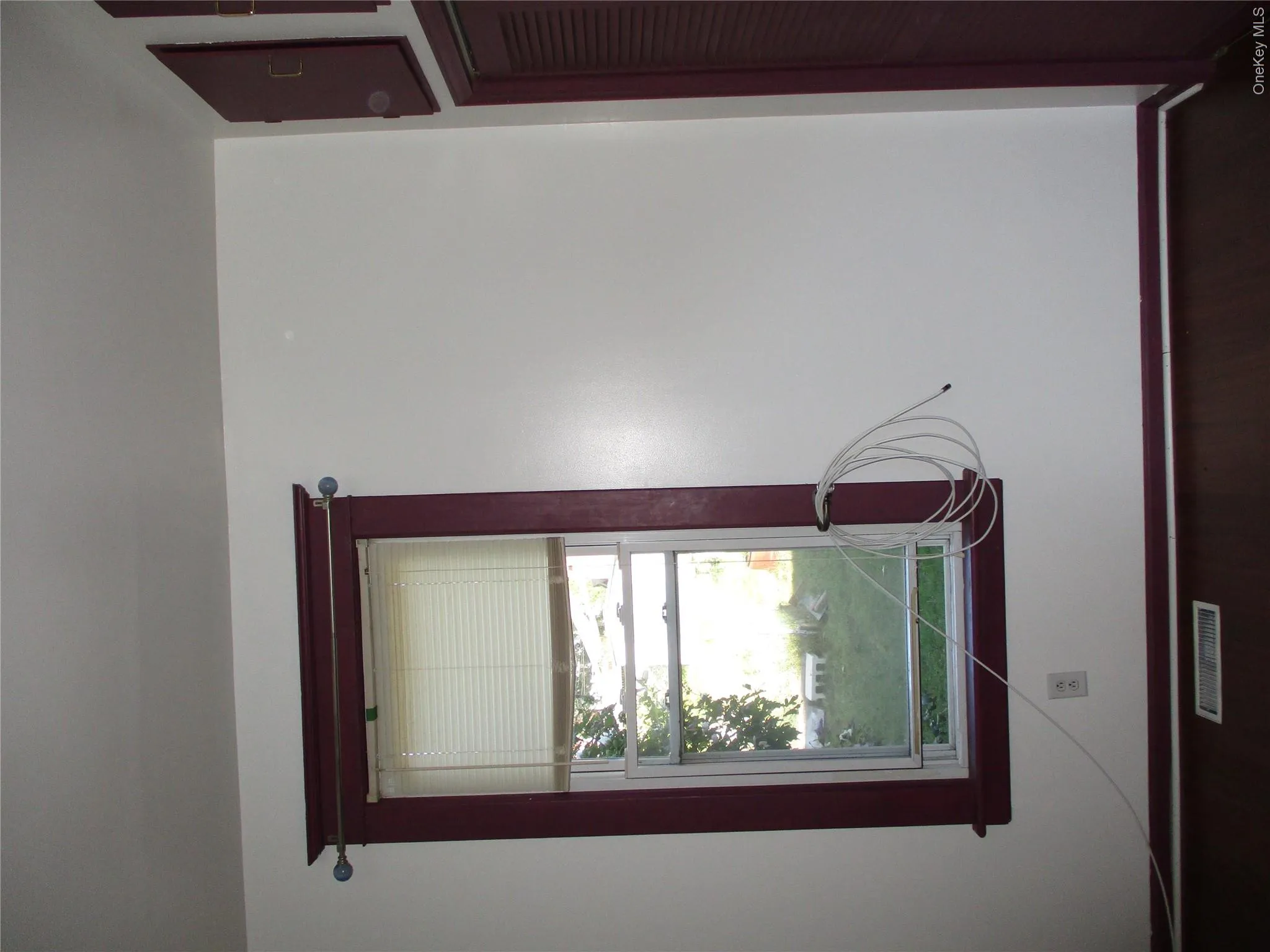 Detailed view of baseboards and wood finished floors Detailed view of baseboards and wood finished floors