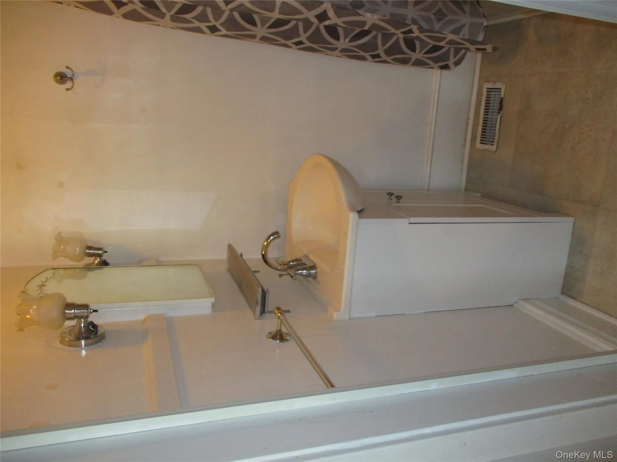 Bathroom featuring vanity and baseboards Bathroom featuring vanity and baseboards