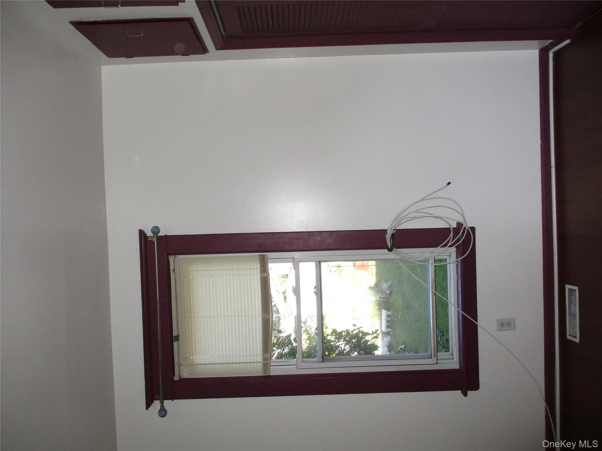 Detailed view of baseboards and wood finished floors Detailed view of baseboards and wood finished floors