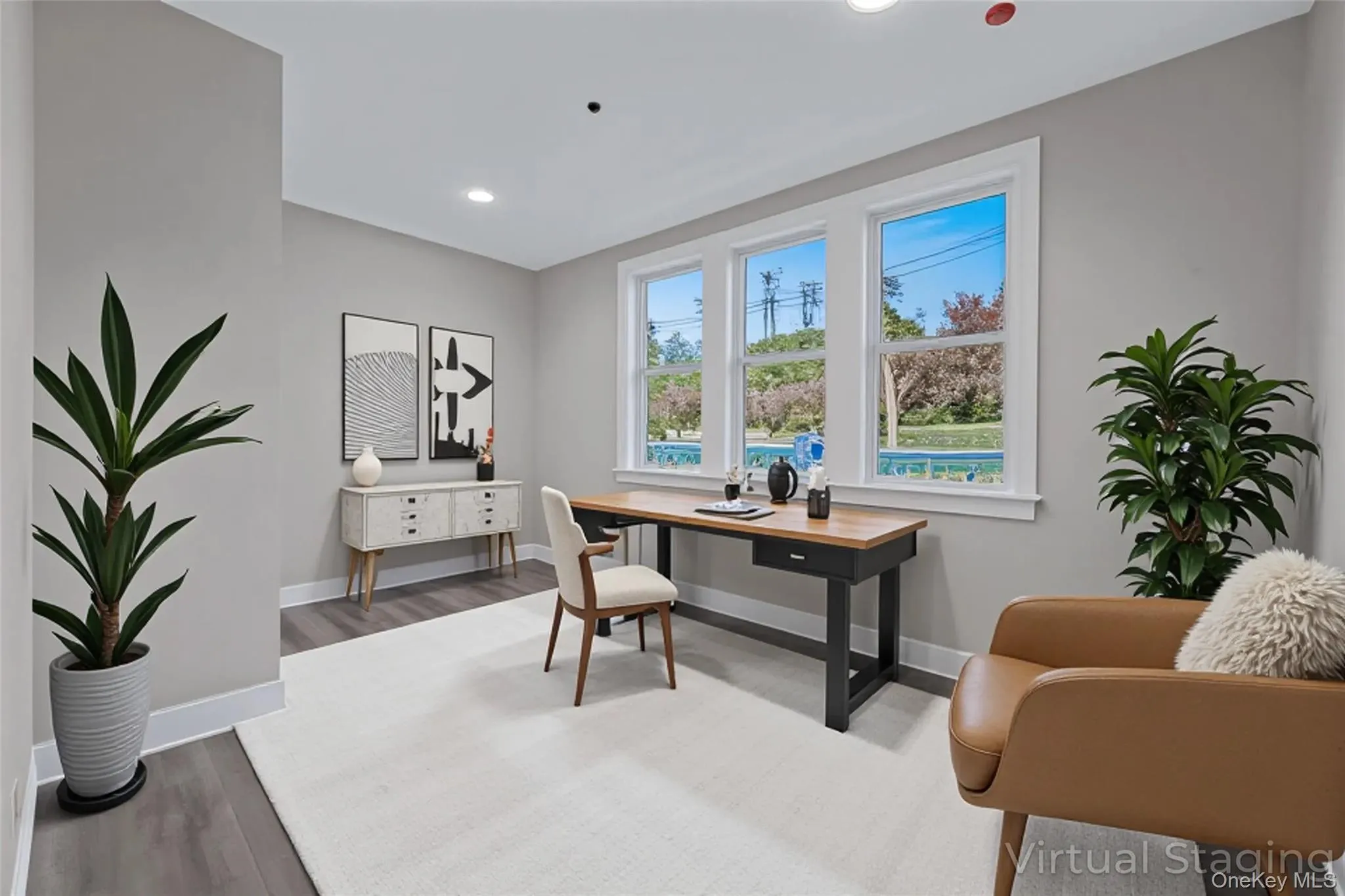 Home office featuring wood finished floors and recessed lighting Home office featuring wood finished floors and recessed lighting