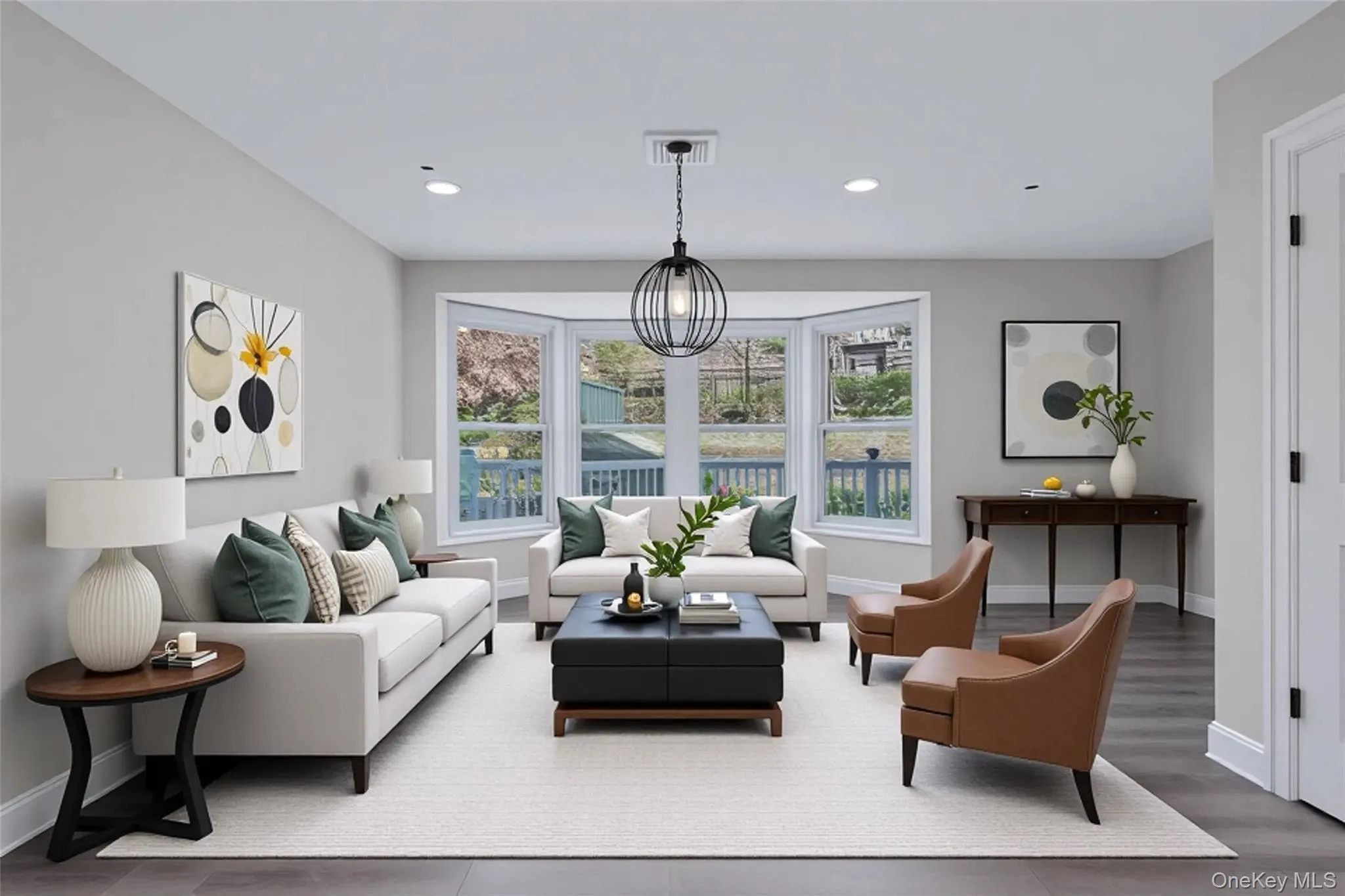 Living area featuring recessed lighting and dark wood finished floors Living area featuring recessed lighting and dark wood finished floors