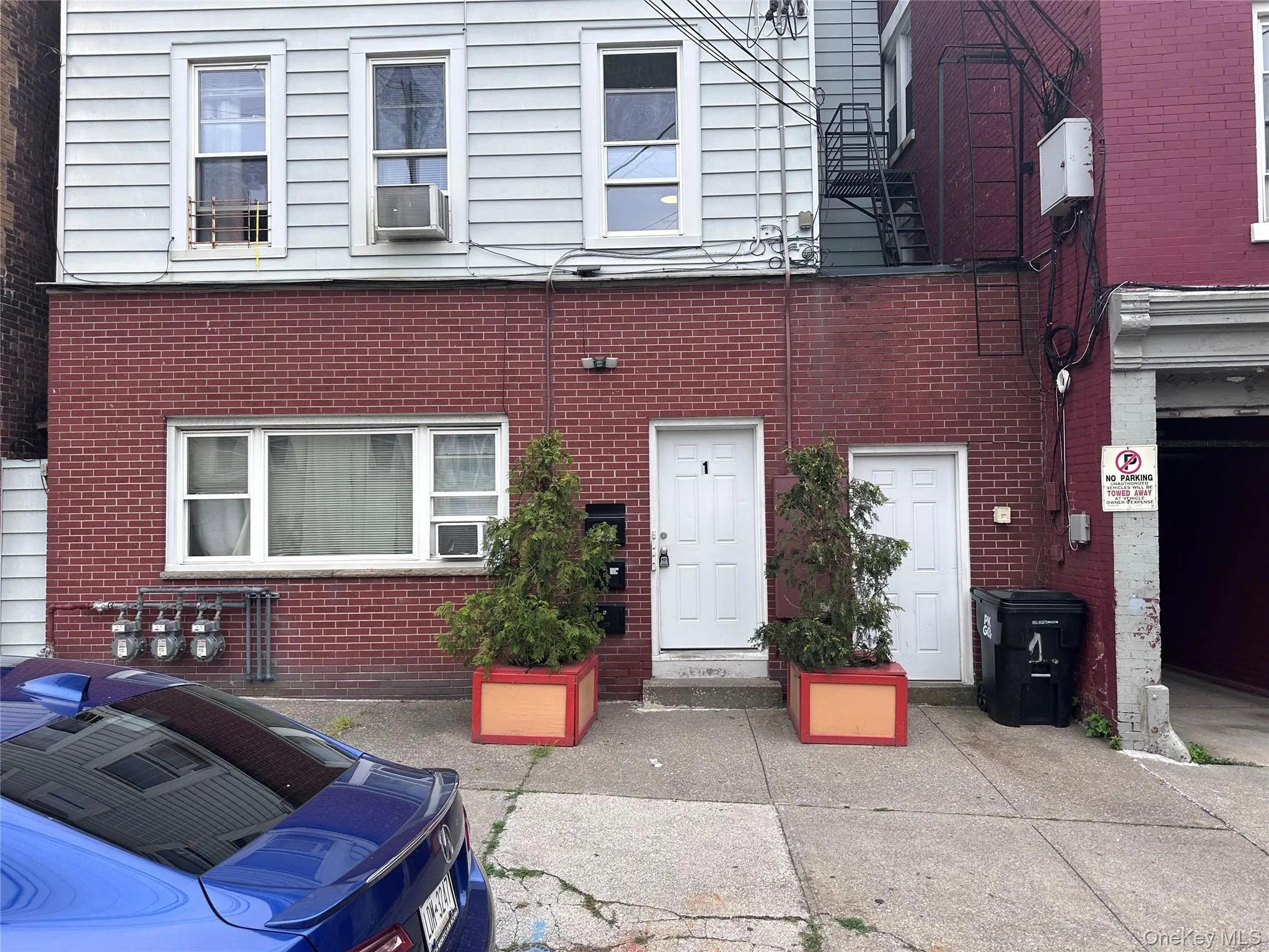 Traditional-style house featuring brick siding Traditional-style house featuring brick siding