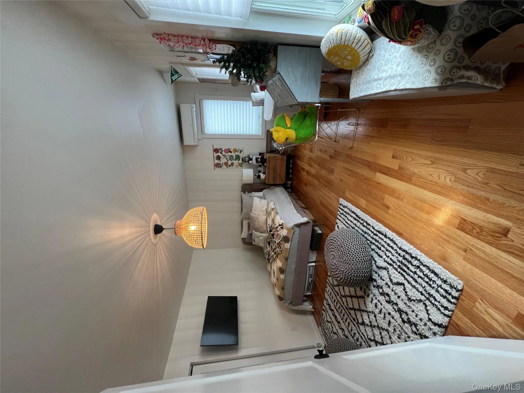 Bedroom featuring light wood-style floors Bedroom featuring light wood-style floors