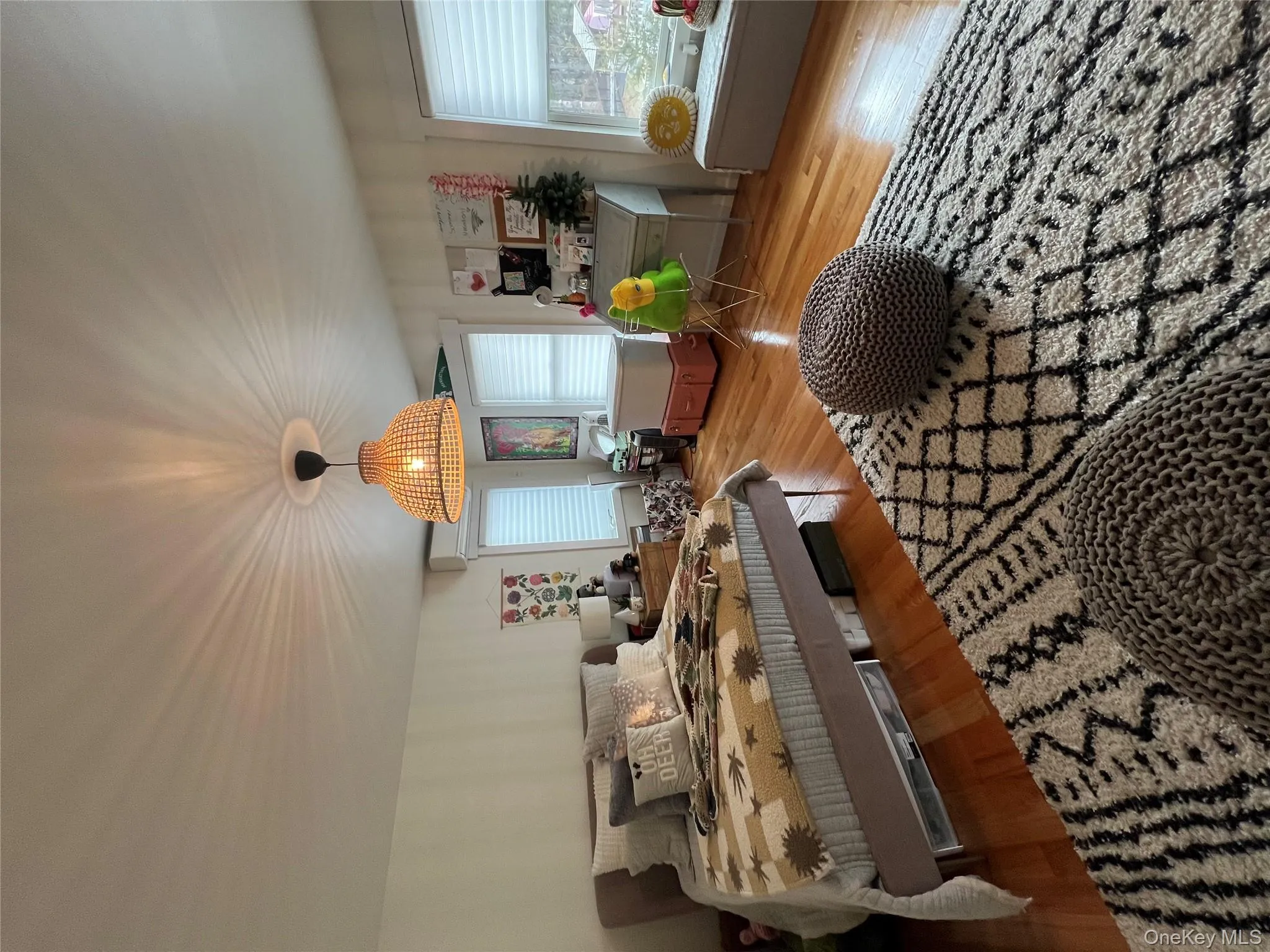 Bedroom with light wood-style flooring Bedroom with light wood-style flooring