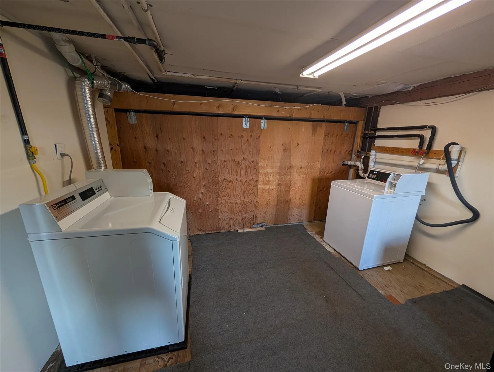 Laundry area featuring washing machine and clothes dryer Laundry area featuring washing machine and clothes dryer