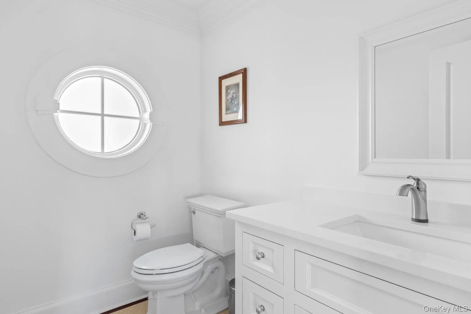 Half bath with vanity and crown molding Half bath with vanity and crown molding