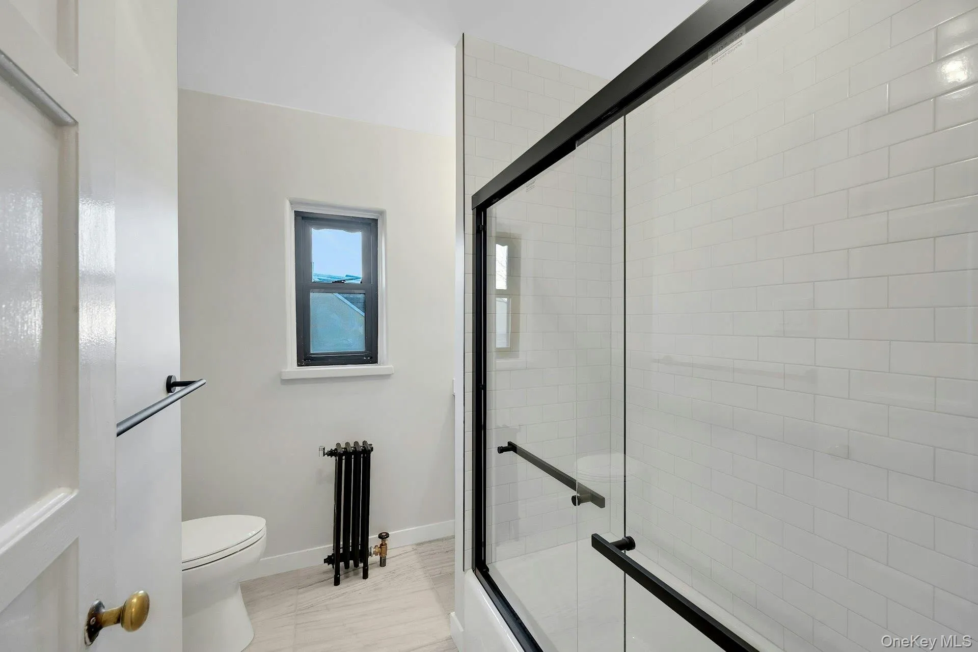 Bathroom with Marble Floors, Vanity & Subway Tile Bathroom with Marble Floors, Vanity & Subway Tile