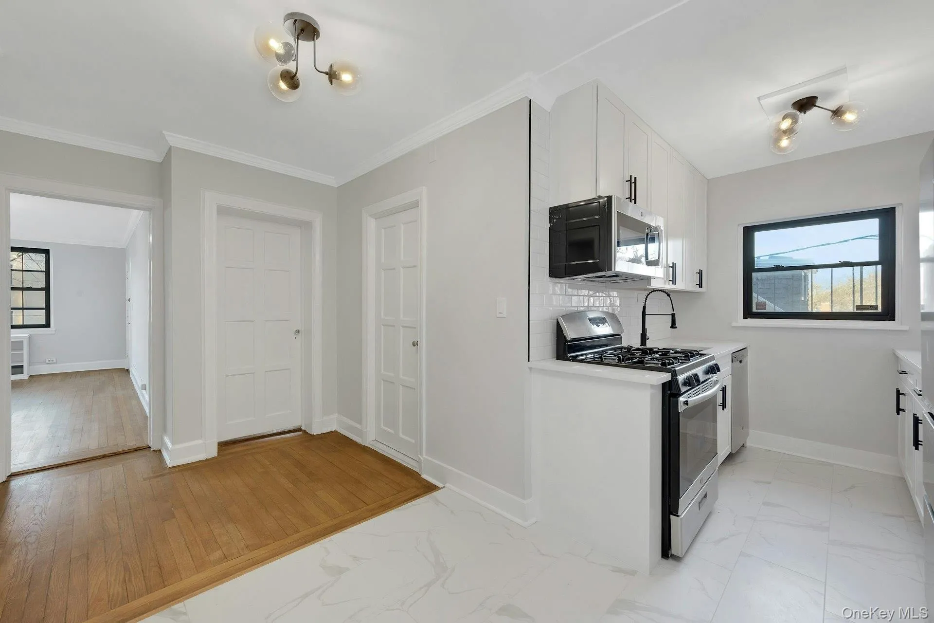 Open Concept Layout, view from Dining area to Living Room Open Concept Layout, view from Dining area to Living Room