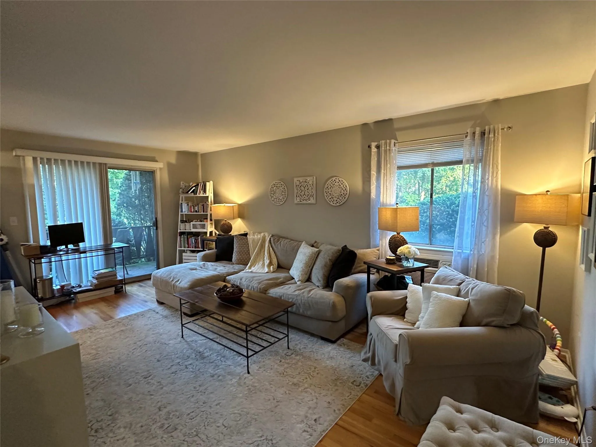 Living area with wood finished floors Living area with wood finished floors