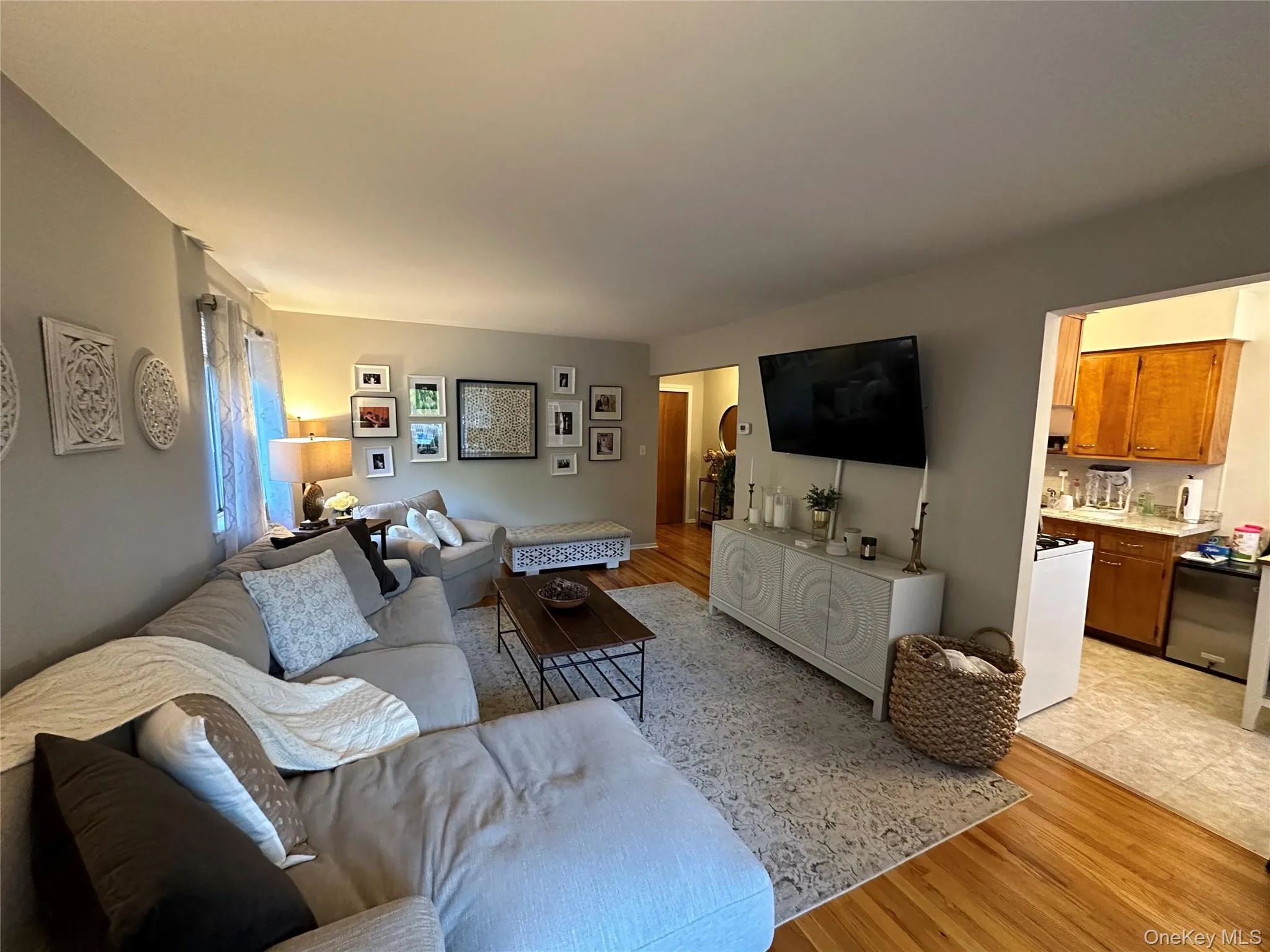 Living room featuring light wood-style floors Living room featuring light wood-style floors