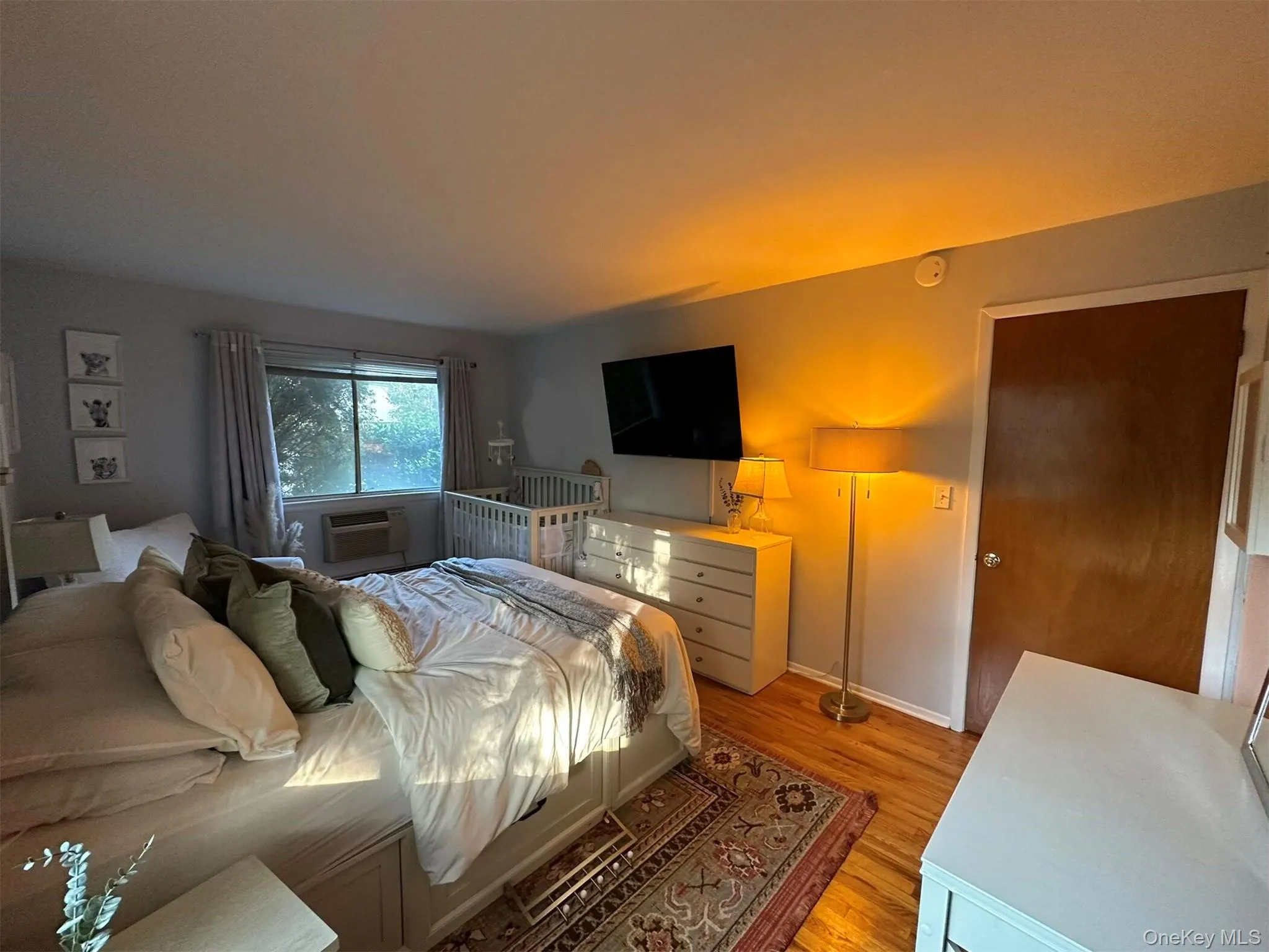 Bedroom with light wood-style floors Bedroom with light wood-style floors