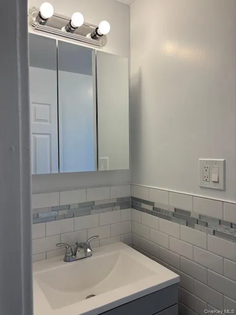 Bathroom featuring vanity Bathroom featuring vanity