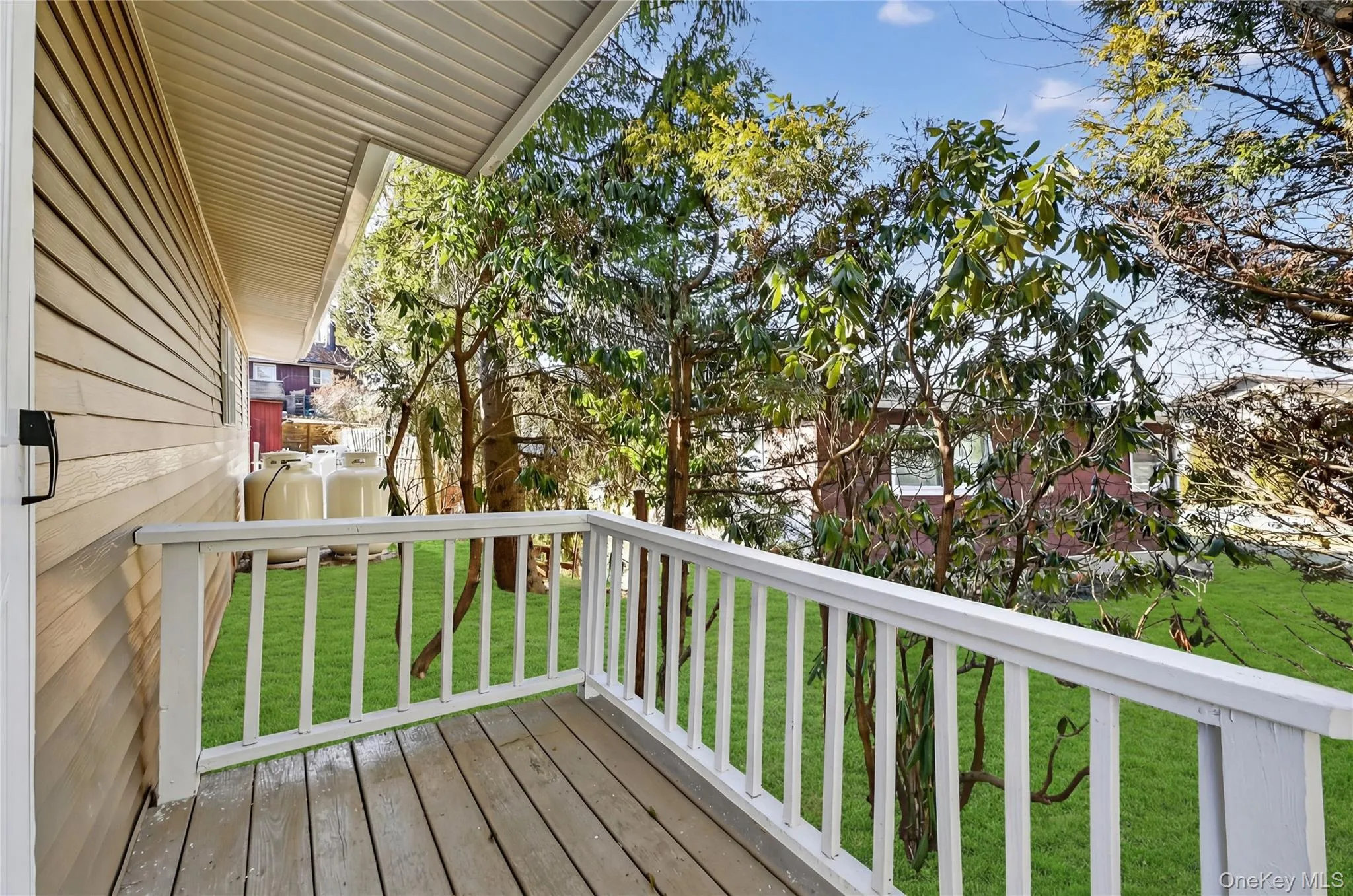 Wooden deck with a yard Wooden deck with a yard