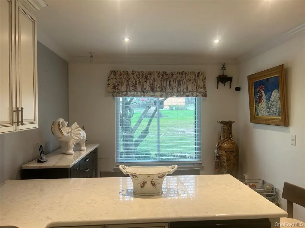 Dining space featuring ornamental molding and recessed lighting Dining space featuring ornamental molding and recessed lighting