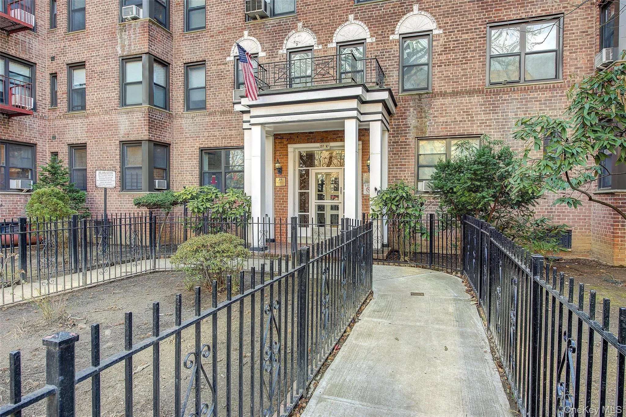 Entrance to property featuring brick siding Entrance to property featuring brick siding