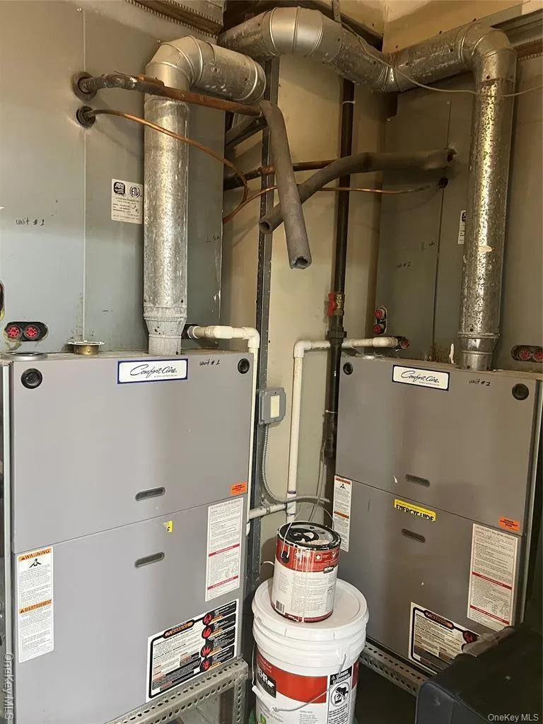 Utilities featuring heating unit Utilities featuring heating unit
