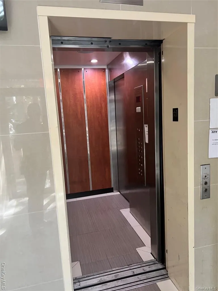 Property entrance featuring elevator Property entrance featuring elevator