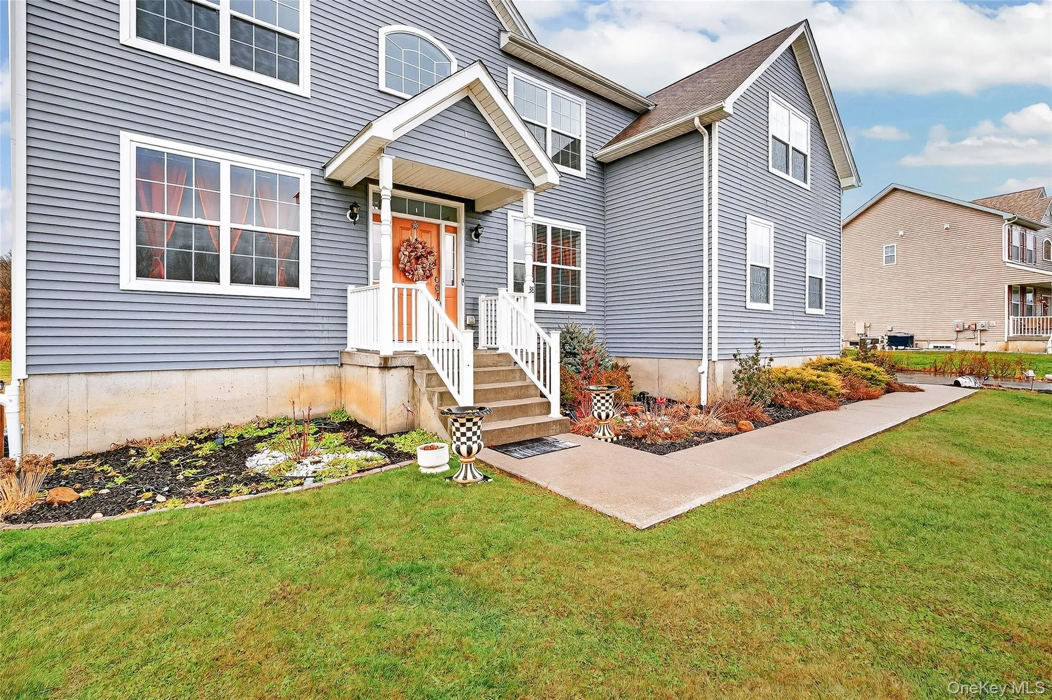 View of front of property featuring a front lawn View of front of property featuring a front lawn
