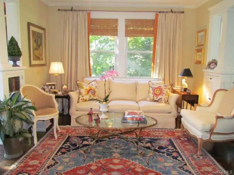 Living room featuring ornamental molding Living room featuring ornamental molding