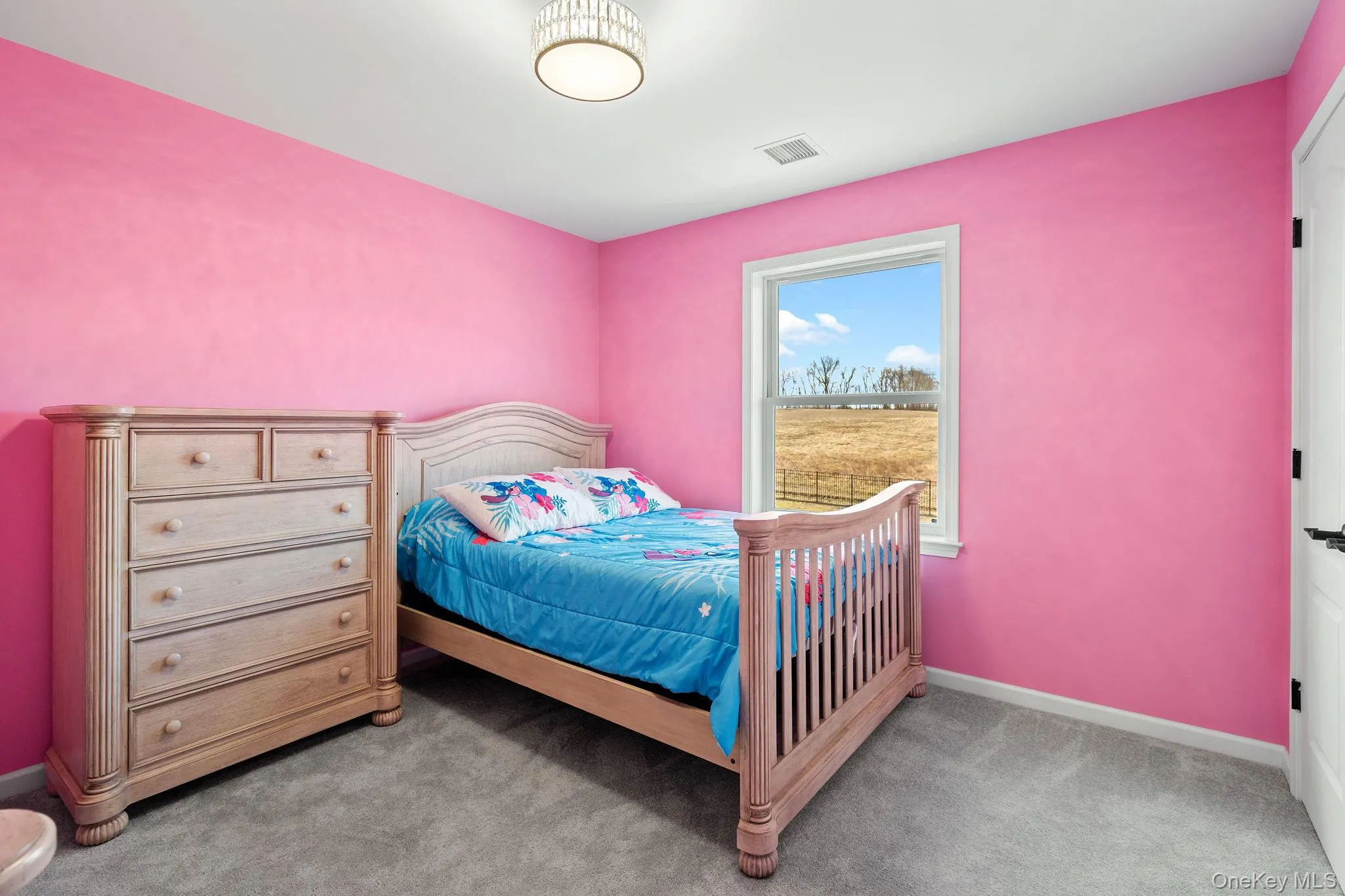 Bedroom with light carpet Bedroom with light carpet