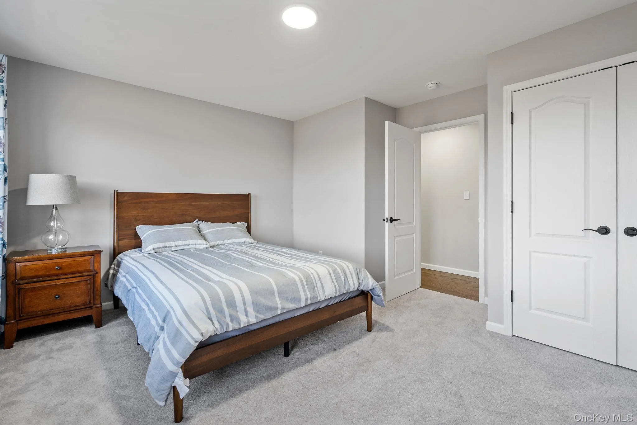 Bedroom with light colored carpet Bedroom with light colored carpet