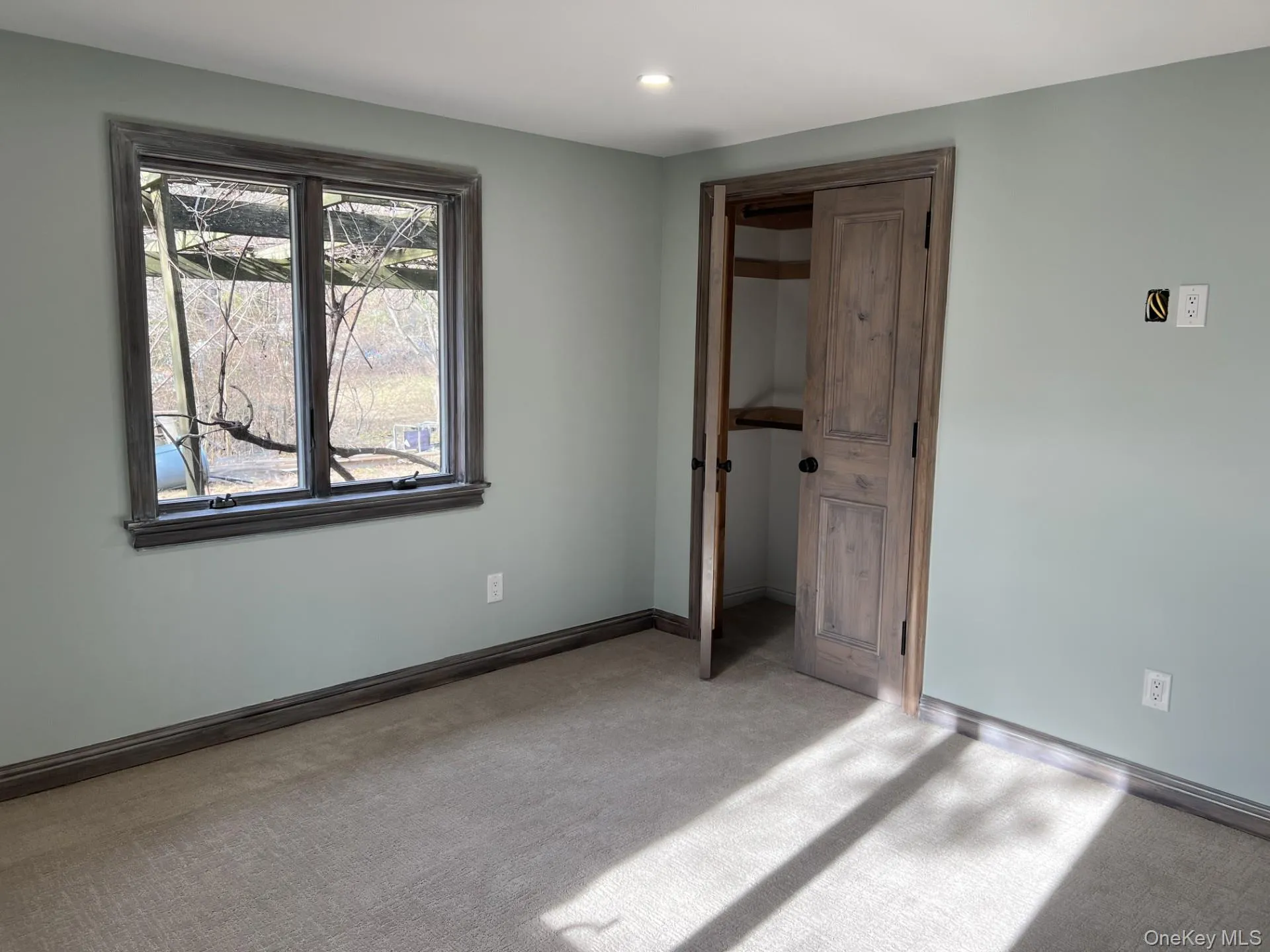 Unfurnished bedroom featuring a closet, carpet flooring, and recessed lighting Unfurnished bedroom featuring a closet, carpet flooring, and recessed lighting