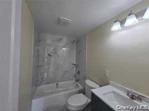 Bathroom with vanity and tub / shower combination Bathroom with vanity and tub / shower combination