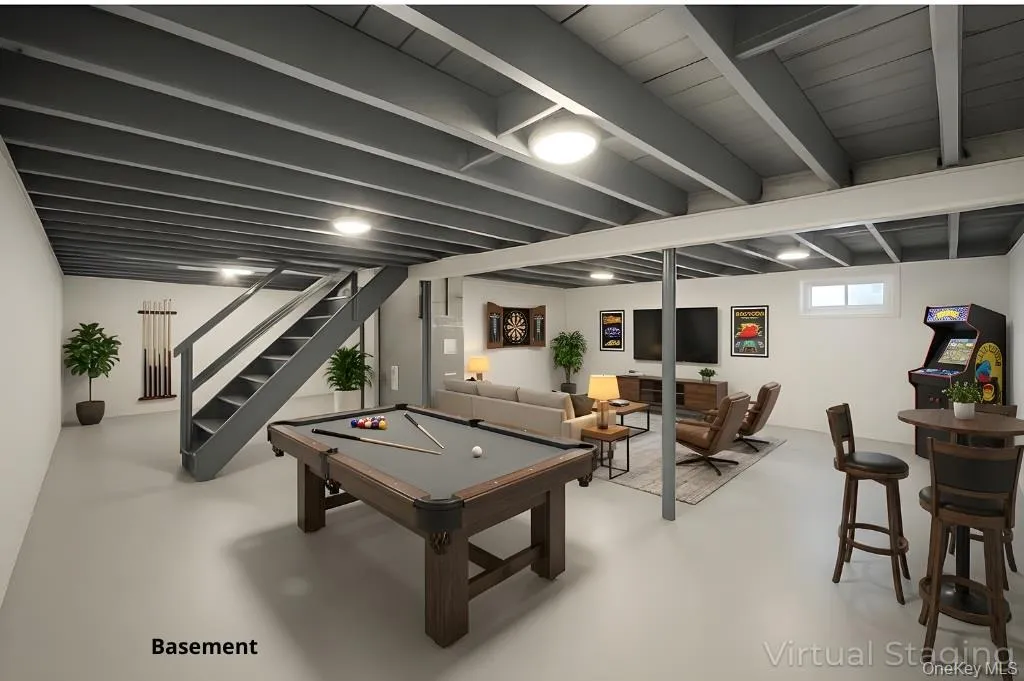 Rec room with finished concrete flooring and billiards Rec room with finished concrete flooring and billiards