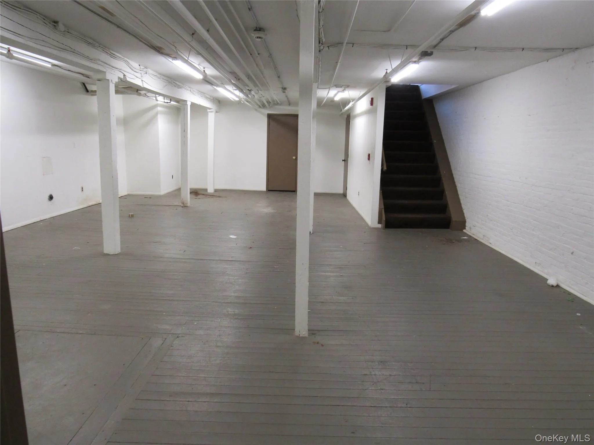 Finished basement with stairs Finished basement with stairs