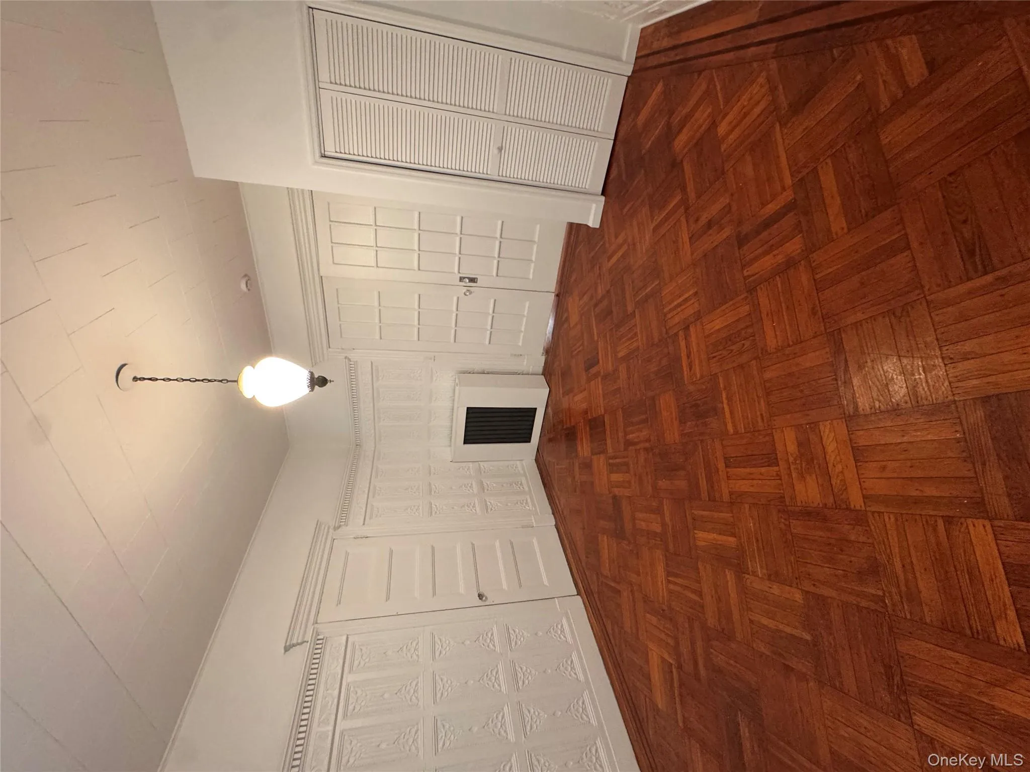 Unfurnished living room featuring baseboards Unfurnished living room featuring baseboards