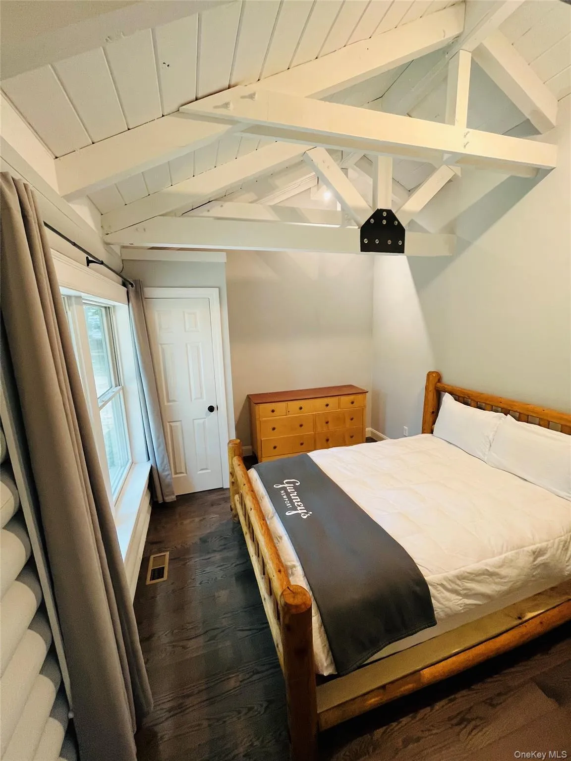 Bedroom featuring wood ceiling Bedroom featuring wood ceiling