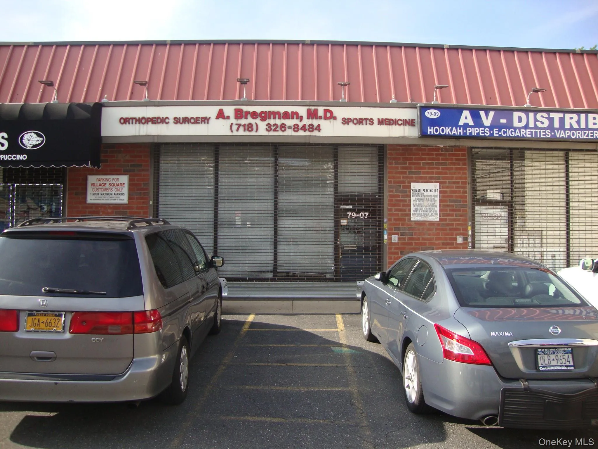View of commercial location featuring uncovered parking View of commercial location featuring uncovered parking