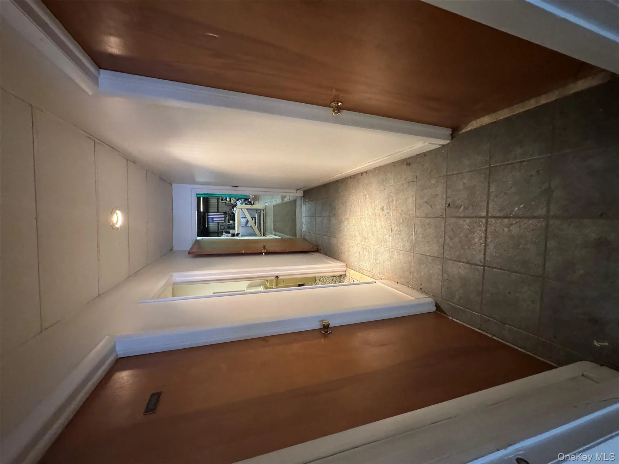 Hall with recessed lighting and baseboards Hall with recessed lighting and baseboards