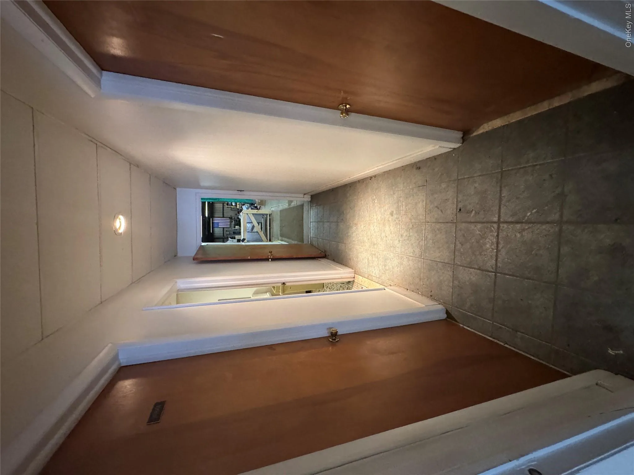Hall with recessed lighting and baseboards Hall with recessed lighting and baseboards